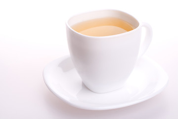 white cup of tea