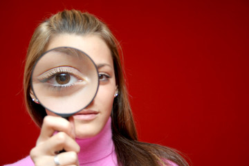 Girl with magnifying lens
