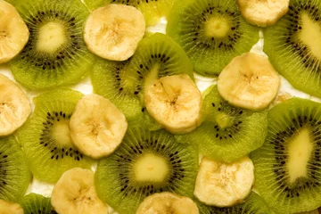 Papier Peint photo Tranches de fruits fond de banane kiwi