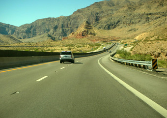 highway through the desert and mountains