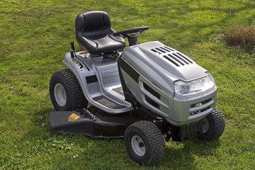 Small tractor for cutting lawn.