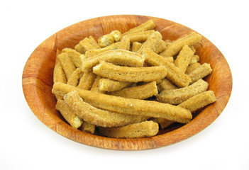 Soya sticks snack food in wooden dish