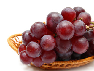 wet grape berry bunch in basket