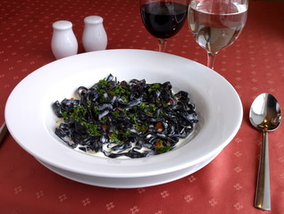 Dish of Italian cuisine - noodles with cuttle ink