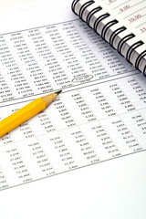 Fototapeta premium Pencil, data tables and notebook