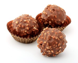 chocolate candies on white background
