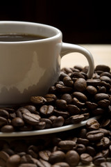 cup of coffee and coffee beans