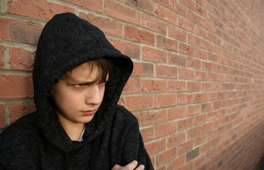 Boy in hooded top