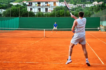 Zelfklevend Fotobehang Man plays tennis outdoors © .shock