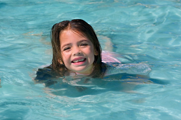 dark haired girl swimming