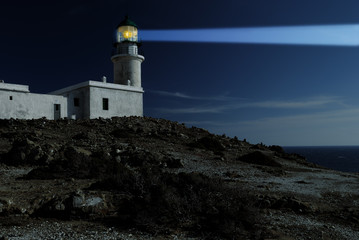 Fototapeta na wymiar White lighthouse at the night