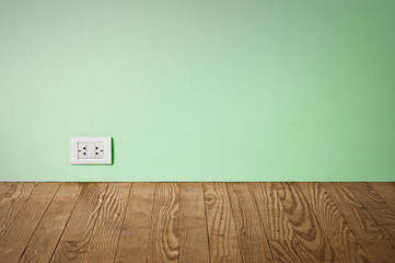 electric outlet in old wall.