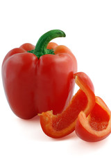 Red bell pepper and Pepper slices isolated on white background (