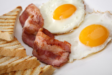 Breakfast - toasts, eggs, bacon