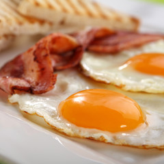 Breakfast - toasts, eggs, bacon