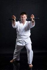 Man In Kimono With Nunchaku