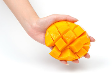 mango slice in hand