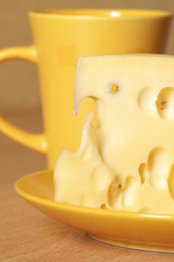 Cheese and yellow cup