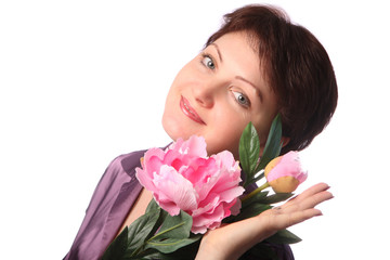 Young beautiful girl with flower peony