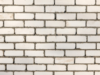 ..wall of white rectangular bricks
