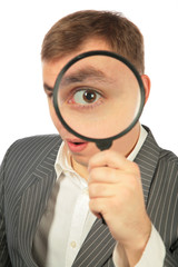 Fototapeta na wymiar businessman with magnifying glass