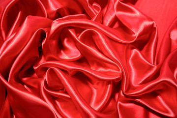 Obraz premium Red silk fabric texture background