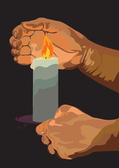 Hand with a burning candle in darkness