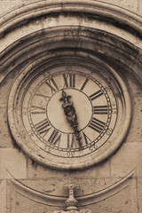 Fototapeta na wymiar Street clock in croatian town Dubrovnik