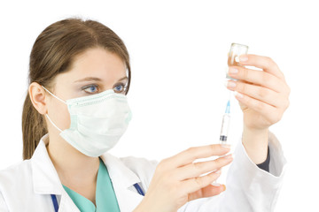 doctor holding syringe and getting ready for injection