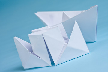 two paper boats