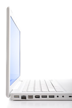 Hi-key laptop. Vertical composition.