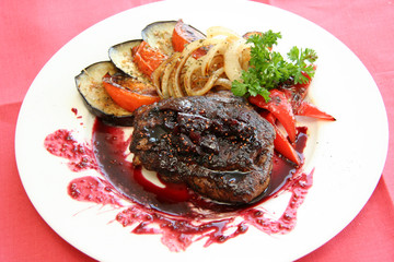 Meat with sauce and vegetables