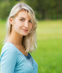 Fototapeta premium Beautiful blond woman outdoors