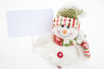 snowman with sign