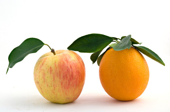 Apple and orange isolated on white background