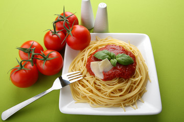 Italian pasta spaghetti with tomato sauce and parmesan.