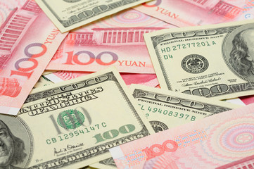 Fototapeta na wymiar US dollar and China yuan closeup