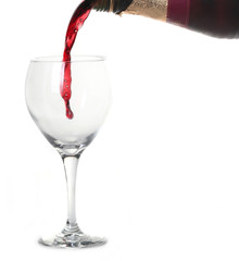 Red Merlot Wine Pouring into a Chilled Glass