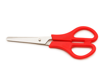 Red scissors isolated on the white background