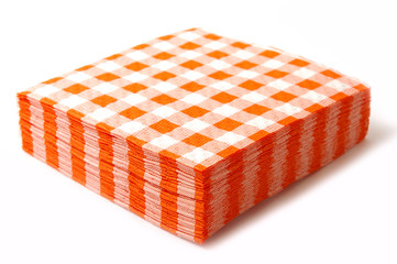 Stack of the paper napkins on white background