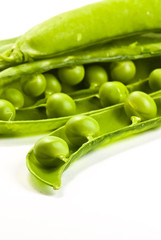 Green peas on white