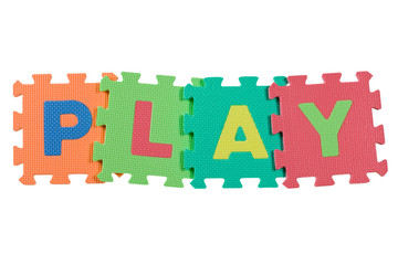 Alphabet blocks forming the word PLAY isolated on white