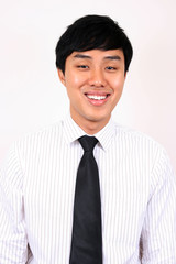 Young and confident Asian business man.