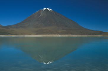 Fototapeta premium Snow Capped Volcano on the Bolivian Altiplano.