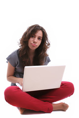 Young beautiful girl working with laptop