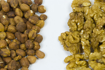 pile of hazelnuts and walnuts prepared for eating raw or baking