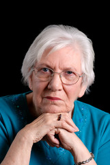 senior woman portrait on black