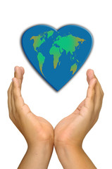 Hand holding heart shapped planet isolated in white
