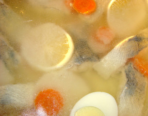 Aspic from a pike perch with a lemon, carrots and egg