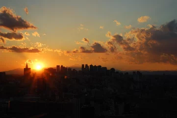 Foto op Plexiglas 都市の夕焼け © minton